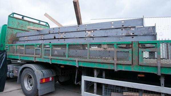 Steel company fined after driver fatally injured while loading flatbed trailer